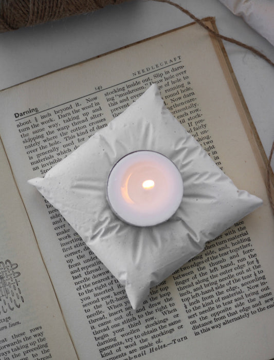 Cushion tea light holder